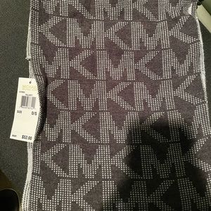 Michael Kors dark and light grey reversible circle scarf.
